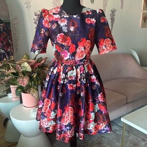 Chicwish purple floral mini dress with 3/4 sleeves.